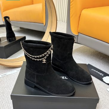 Bốt Chanel đế thấp cổ rộng màu đen da lộn sang trọng