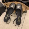 Giày búp bê Chanel hở gót màu đen mũi vuông đế cao chắc chắn logo đính ngọc lấp lánh