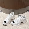 Giày sneaker cao gót Chanel 2025 màu trắng logo nổi bật phong cách sang trọng