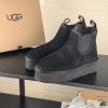 Boot UGG cổ chun màu đen da bò mềm mịn đế cao tôn dáng