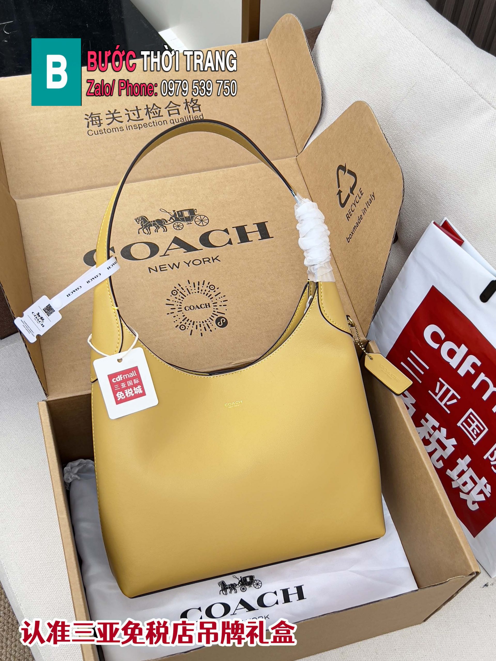 Túi kẹp nách Coach Brooklyn28 màu vàng size 28 cm da trơn mịn