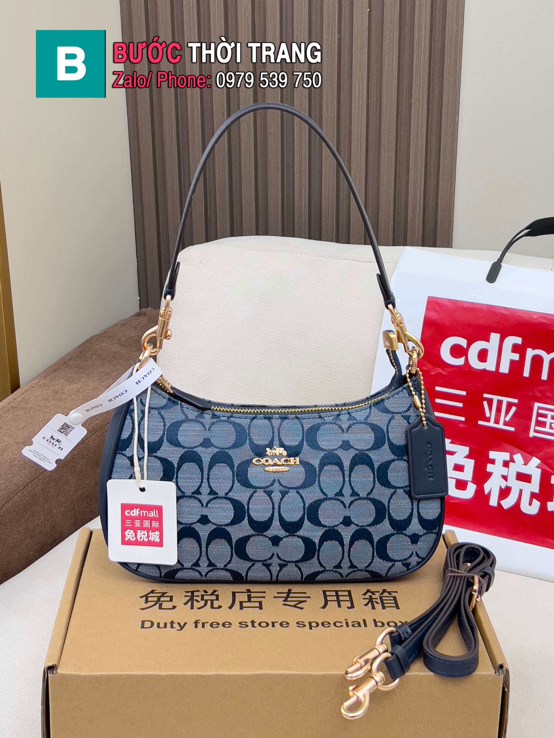 Túi Coach Teri dạng kẹp nách màu xanh coban size 24.5x15.5x7.5 cm