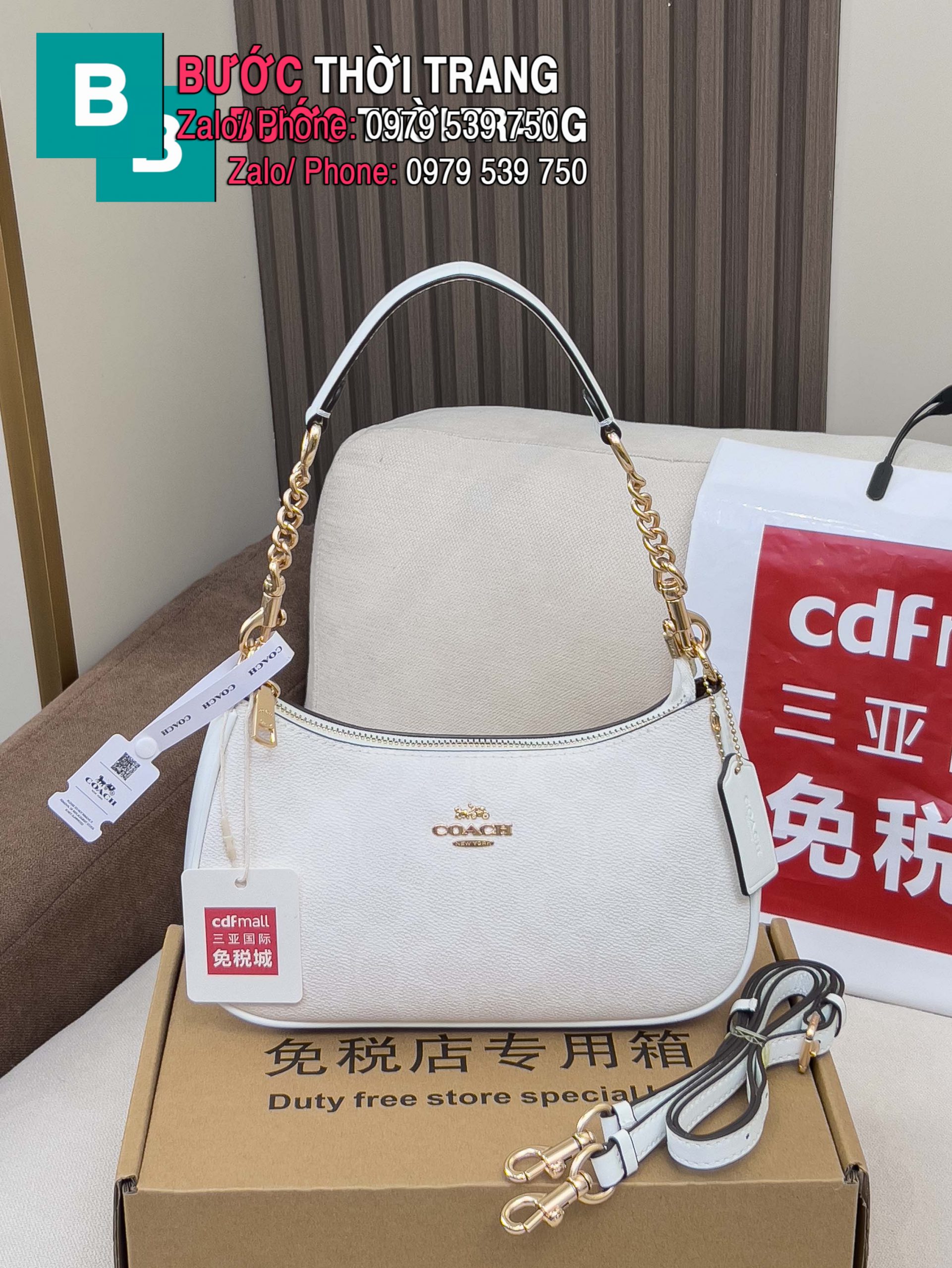 Túi Coach Teri dạng kẹp nách màu trắng ngà size 24.5x15.5x7.5 cm