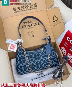 Túi kẹp nách Coach cỡ vừa màu xanh mang đến vẻ đẹp trẻ trung
