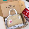Túi xách COACH cầm tay size 23x17x10 cm màu trắng nude phong cách sang trọng
