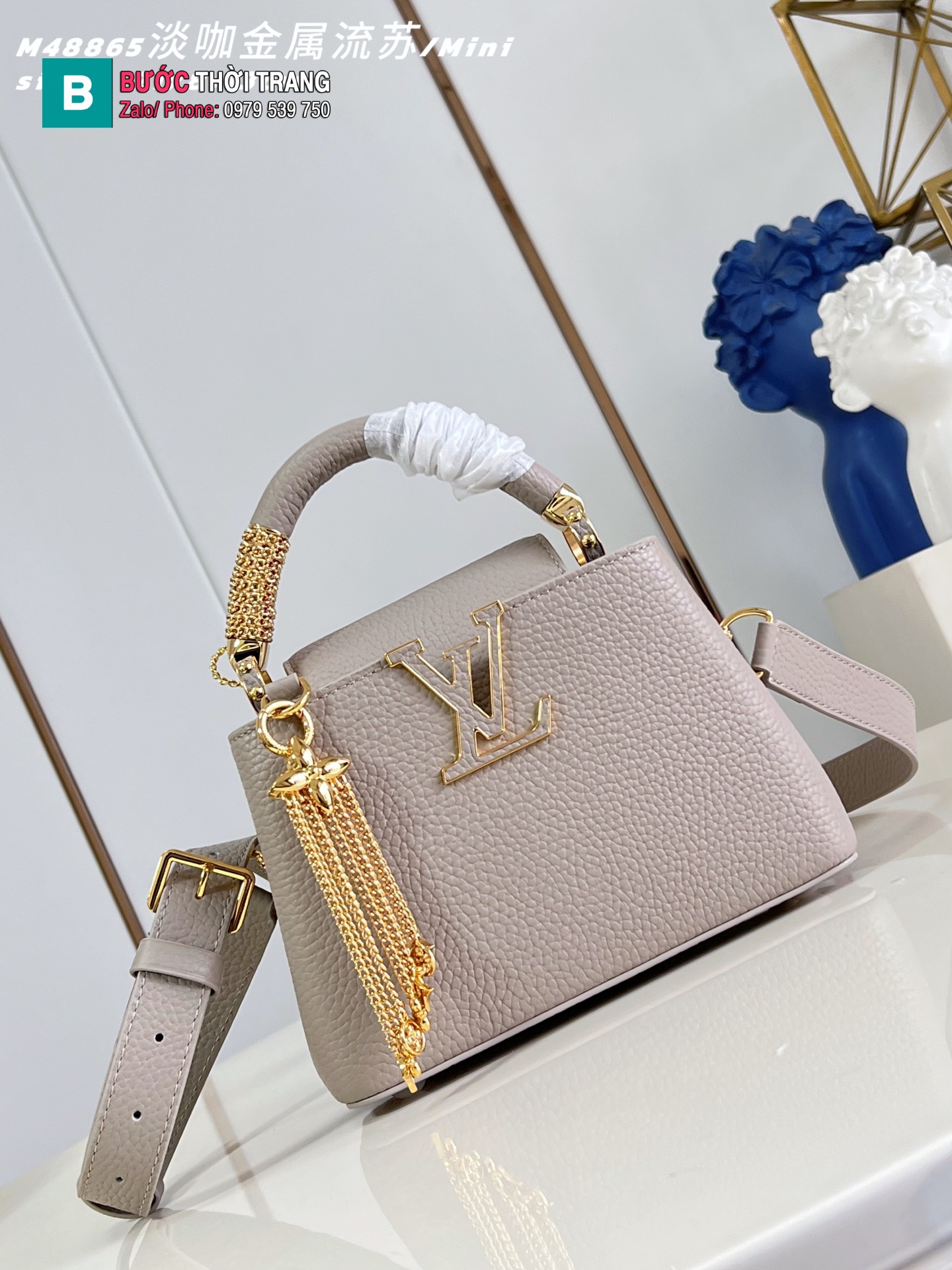 Túi xách LV CAPUCINES màu nâu ghi cao cấp size 21 cm nổi bật với chi tiết tua rua kim loại lấp lánh